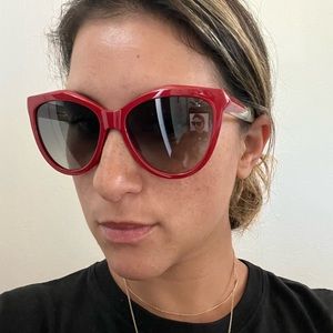 Givency  by cat eye sunglasses in true red